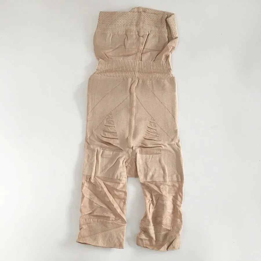 Black high-waisted seamless shapewear shorts for women laid flat.