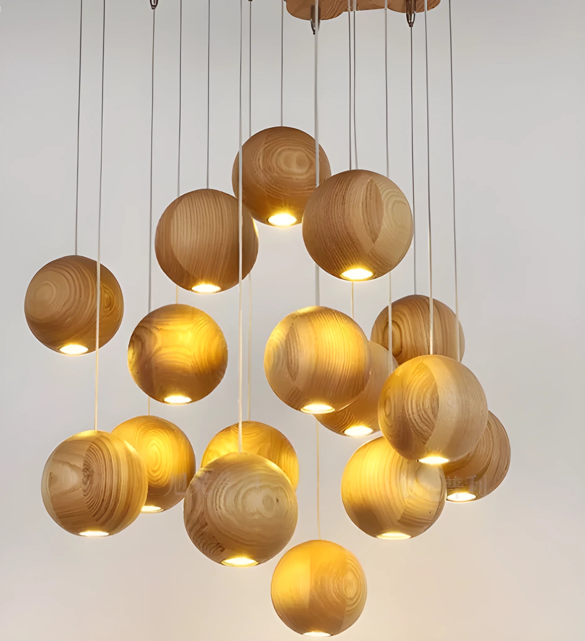 Nordic style solid wood ball chandelier pendant light with adjustable hanging cord.