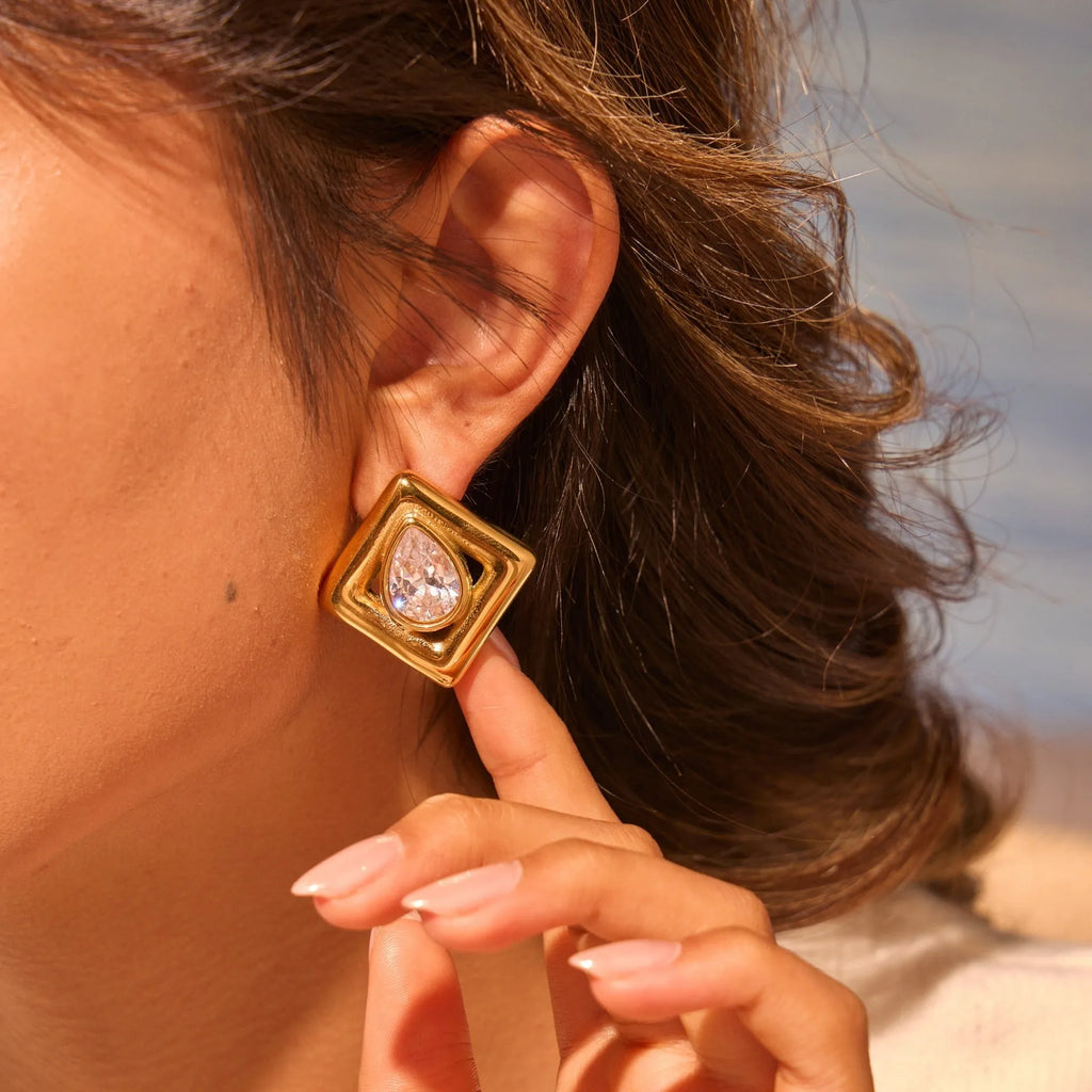 Gold stud earrings with geometric water drop zircon stones on stainless steel