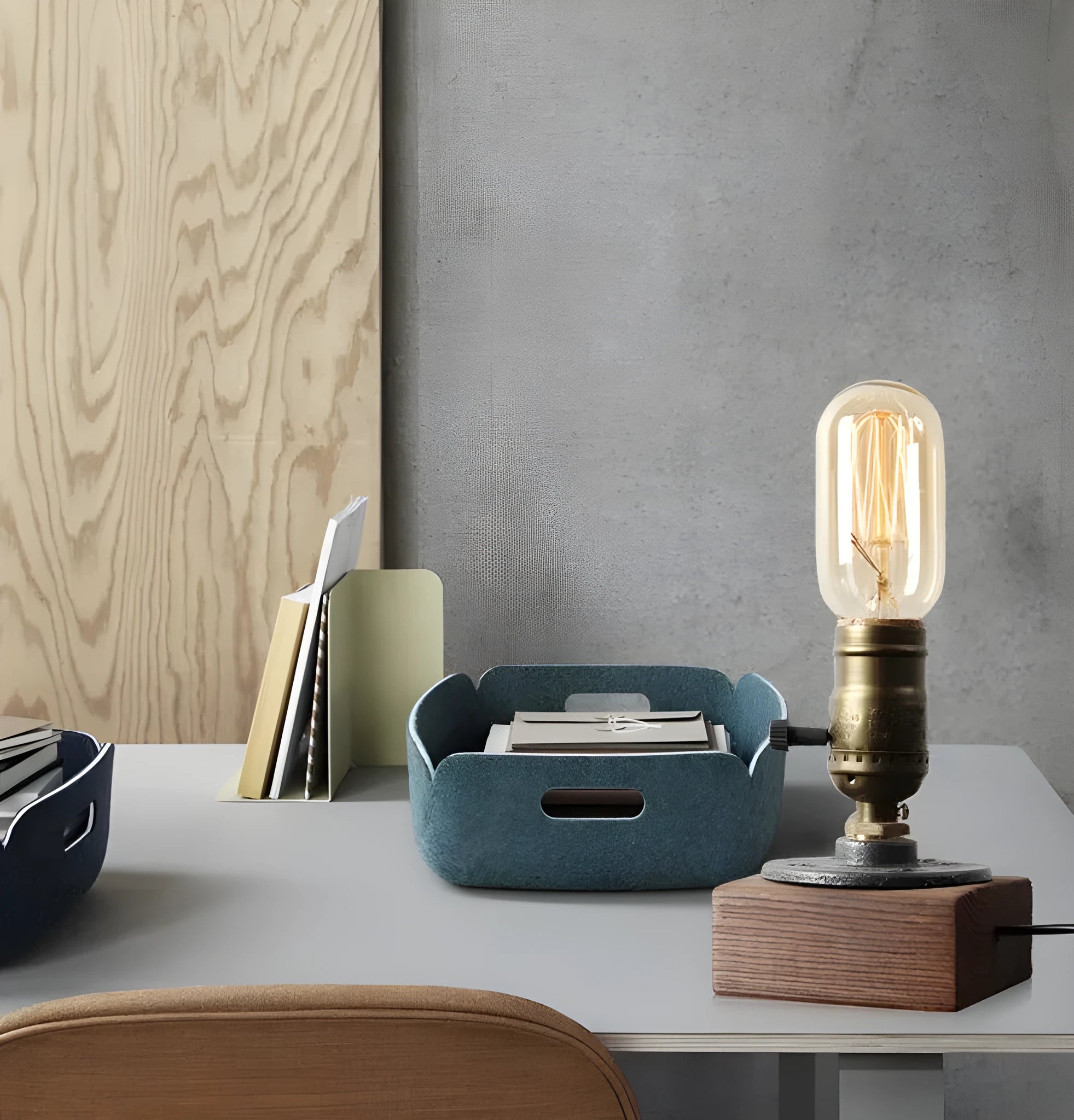 Small wooden and iron water pipe shaped table lamp on a table