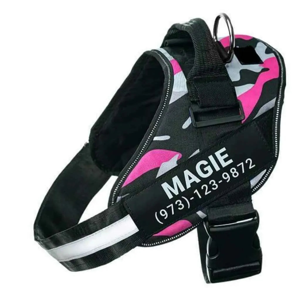 Adjustable reflective dog harness with handle and D-ring on blue background showing size chart