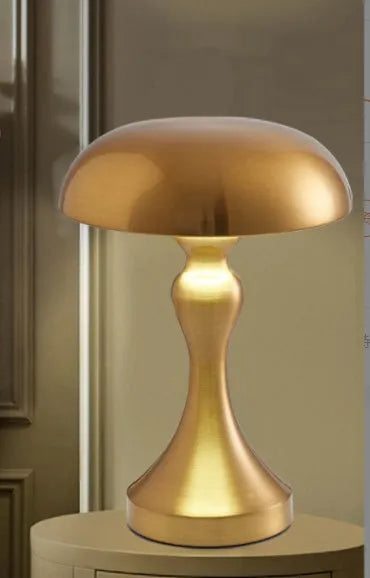 Rechargeable LED desk lamp in bronze finish with touch controls and three light settings