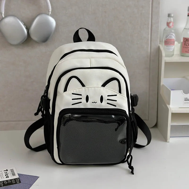 Korean cartoon animation style backpack in two sizes with curved shoulder straps.