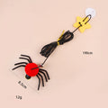 Red cat door hanging toy with elastic rope, feathers, bell, and spider attachments for interactive play