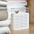 White recyclable cabinet dehumidifier box with transparent top showing colour-changing crystals