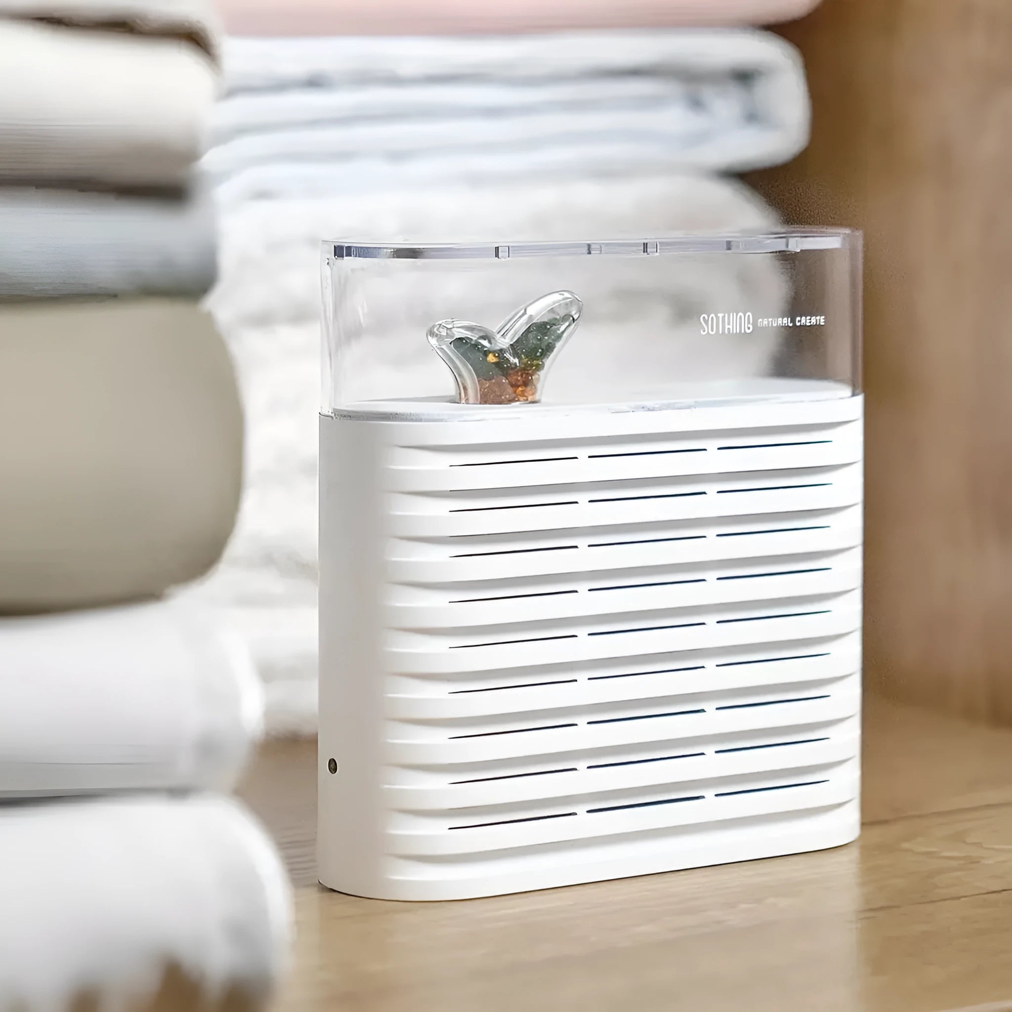 White recyclable cabinet dehumidifier box with transparent top showing colour-changing crystals