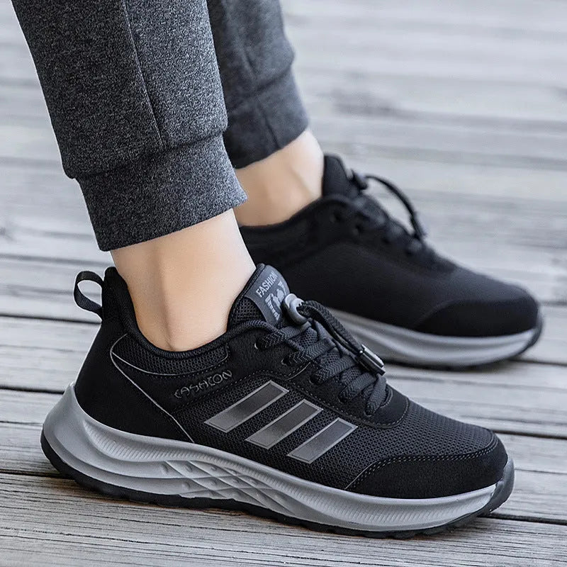 Breathable non-slip casual shoes with mesh upper and elastic band closure in black, dark grey, purple, and purplish red.