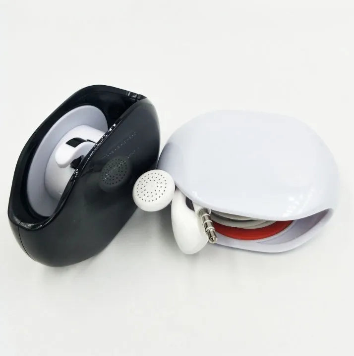 Automatic earphone retractor winder in black with extended cable showing push-type mechanism