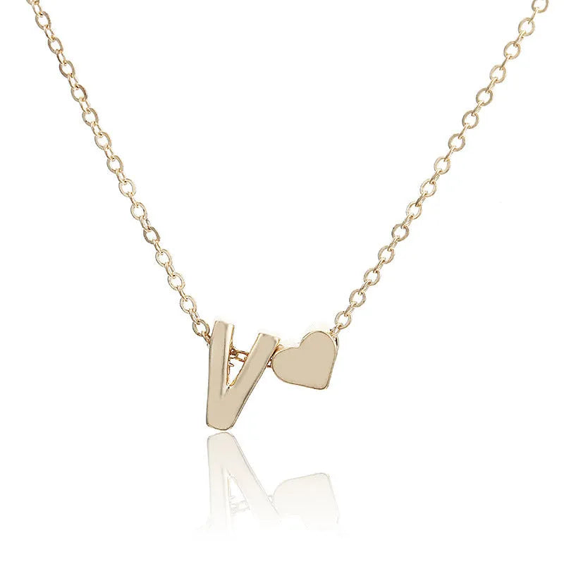 Peach heart shaped alloy letter pendant necklace on chain in gold colour