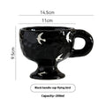 Hand-pinched irregular ceramic mug in solid colour with modern simple style, shown from side angle