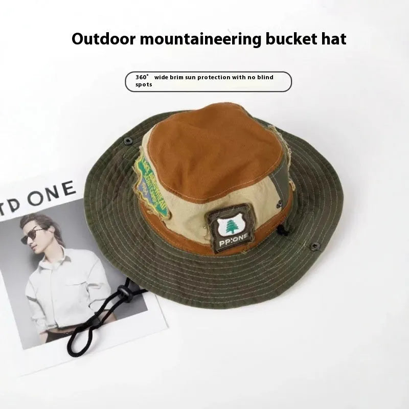 Army green foldable fisherman hat with flat top crown and patchwork cotton fabric design