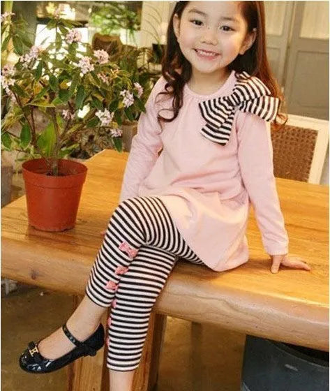 Pink cotton girls clothing set shown in sizes for 110cm, 120cm, 130cm, and 140cm.