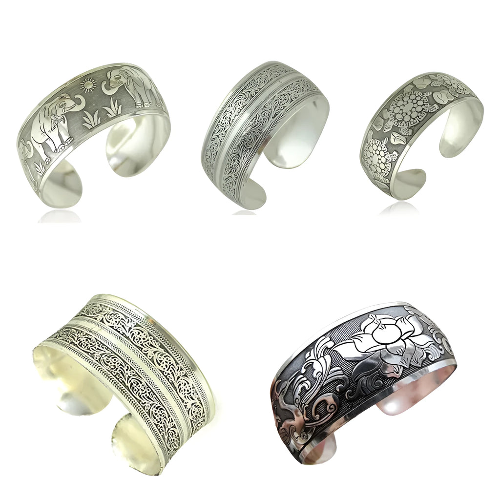 Carved open Miao silver bracelet with Roman shape design in turtle or elephant colour