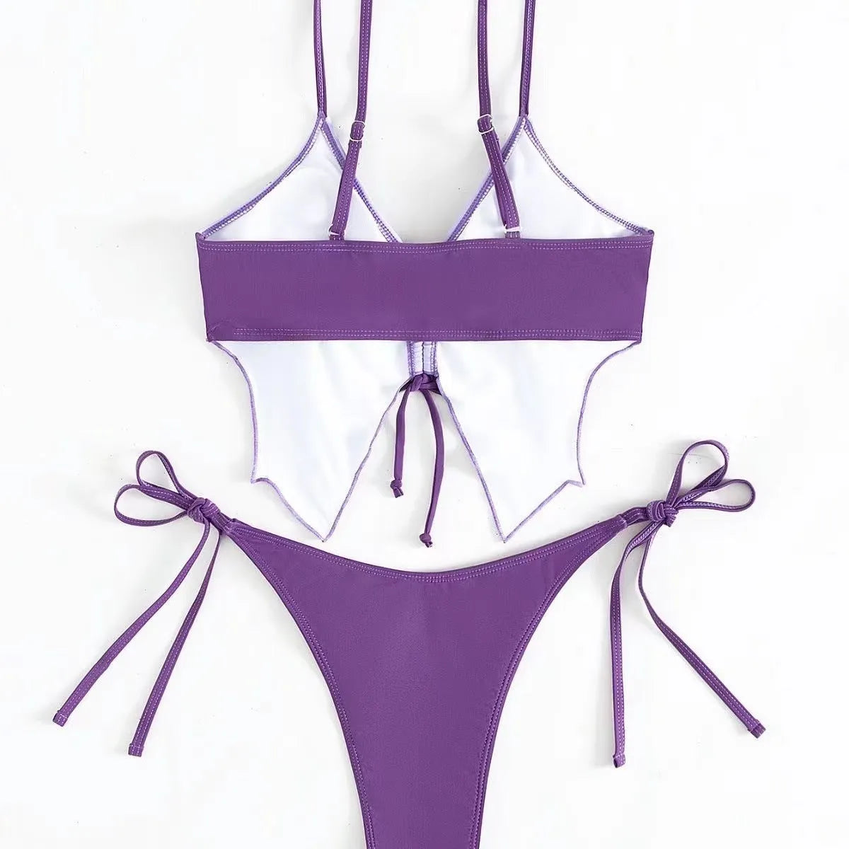 Women's purple split bow back bikini swimsuit set on mannequin, showing sleeveless top and briefs.