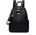 Medium Oxford cloth rucksack showing internal phone and ID compartments with dual straps