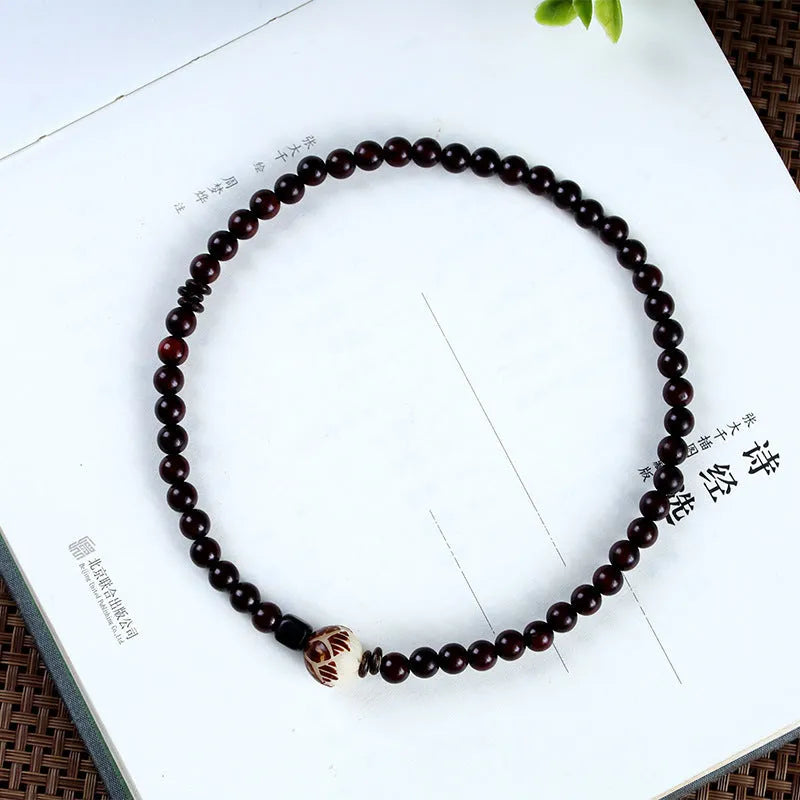 Natural rosewood double-ring bracelet with 10mm flower-shaped beads and knitted construction
