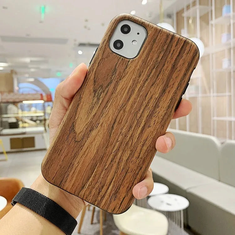 Natural wood iPhone case in back cover style showing timber grain patterns