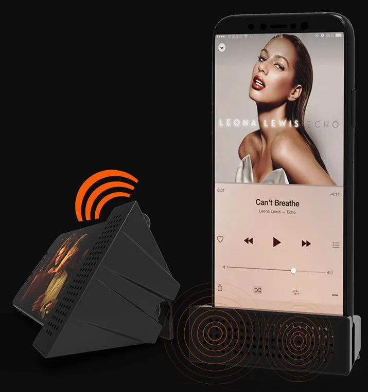 Mini mobile phone amplifier bracket on desktop enhancing smartphone sound in black, blue, pink or orange