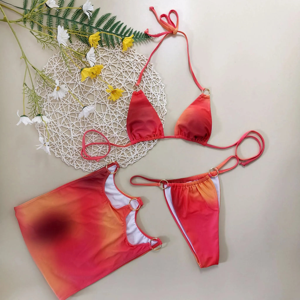 Women's three-piece tie-dye halter bikini swim set with matching skirt in solid colour gradient pattern