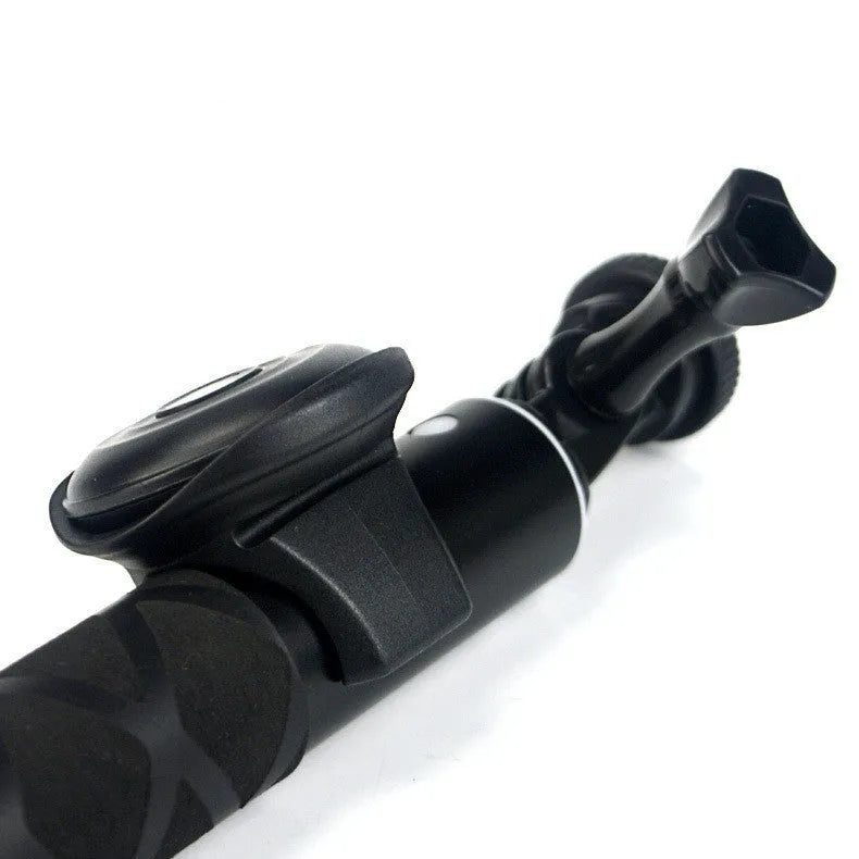 Black snap-on Bluetooth remote control for wireless smartphone camera shutter.