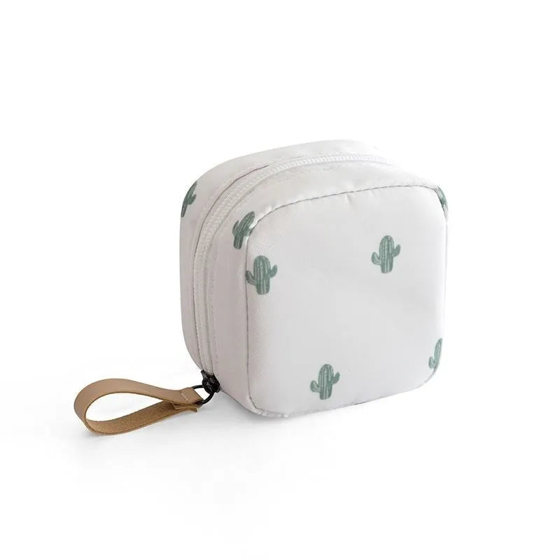 Cloth cube-shaped makeup storage bag shown in blue, pink, white, and white pink colour options.