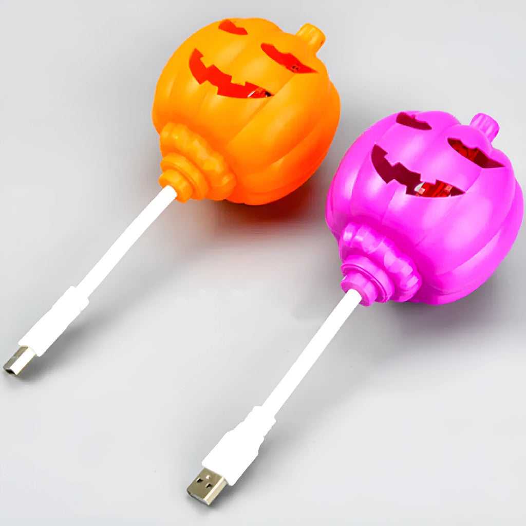 Plastic pumpkin decorative lamp with USB charging cable and yellow or purple light options