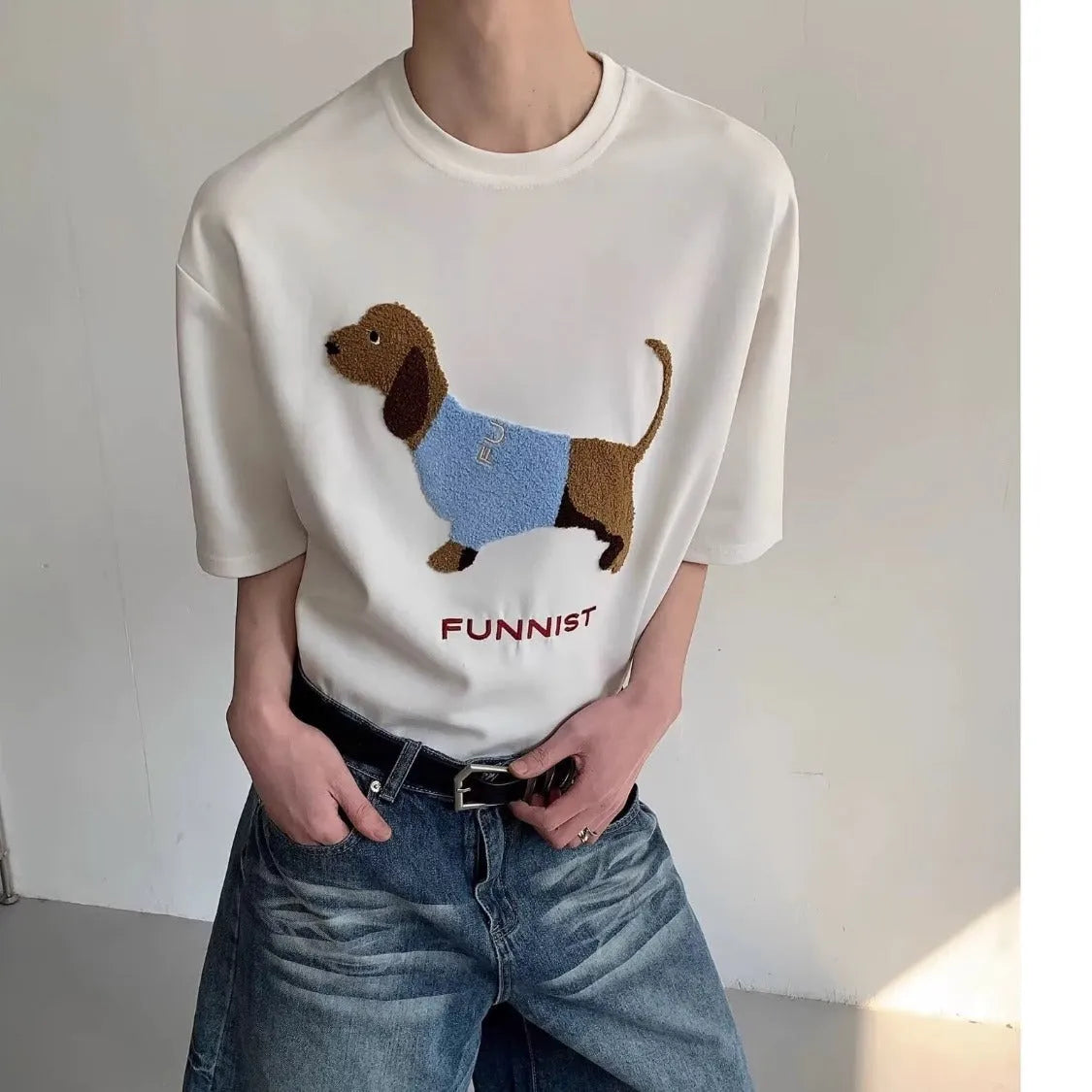 Men's grey cotton T-shirt with embroidered sausage dog design on the front.