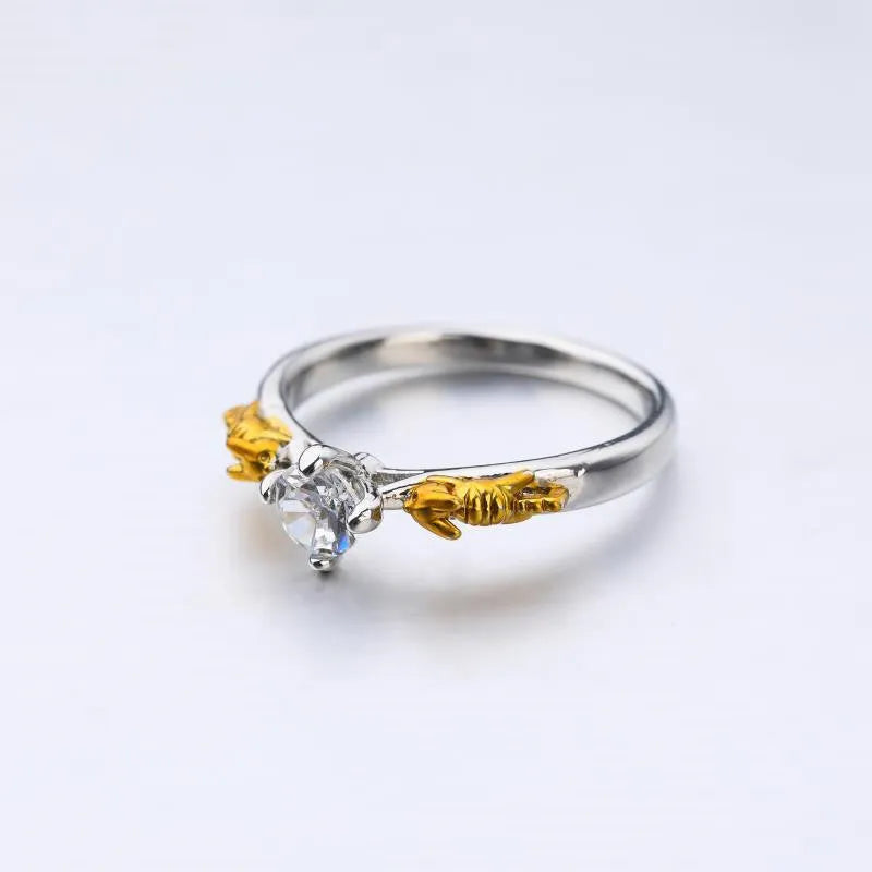 Crystal crown cosplay ring with black gold plating on copper base, showing crown modelling detail.