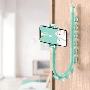 Flexible worm design mobile phone holder with suction cup mounted on desktop showing 360-degree rotation