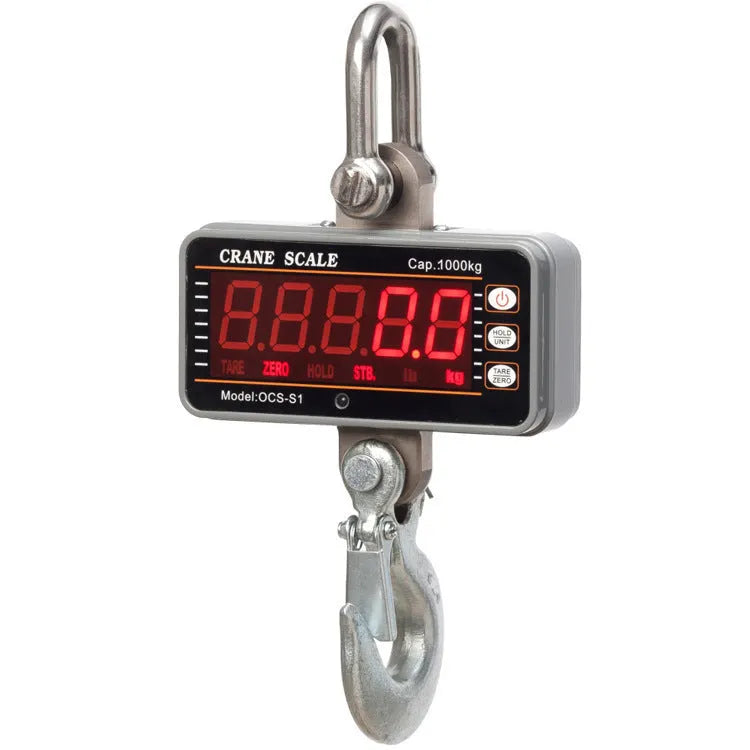 Orange electronic crane scale with direct digital display rated for 500kg load in warehouse