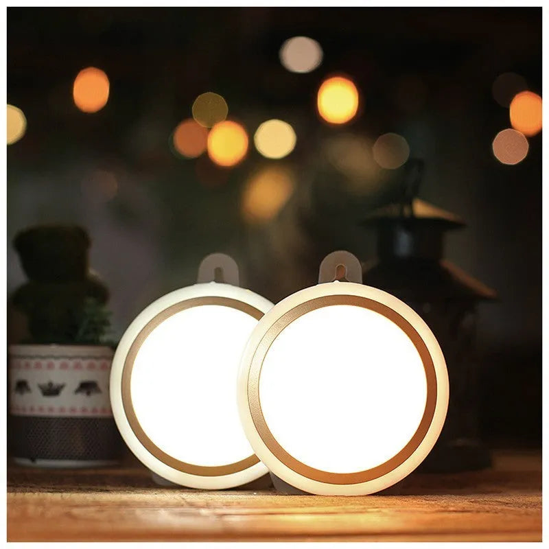 Round white motion sensor LED light with 80mm diameter for wardrobe and cabinet installation