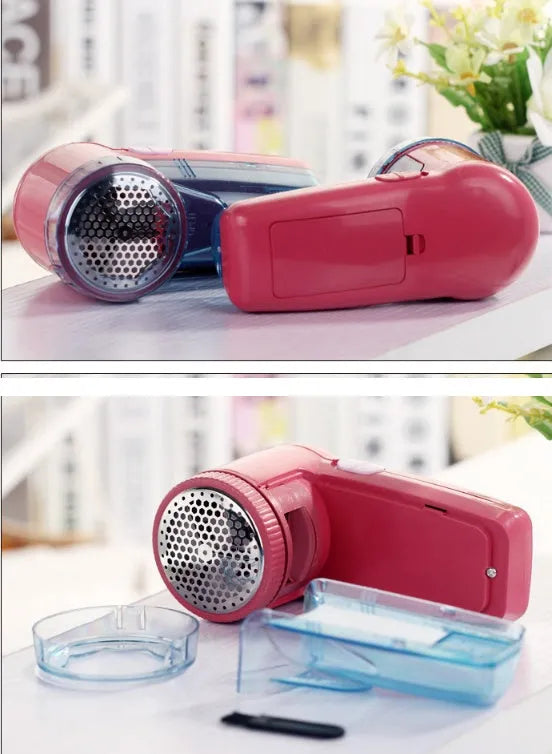 White portable electric lint remover for clothing, showing compact size and USB-C charging port.