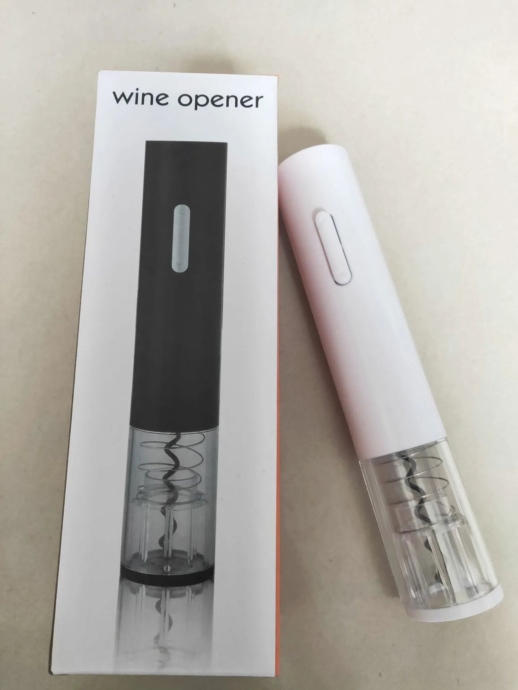 Black electric wine bottle opener with automatic corkscrew mechanism and foil cutter
