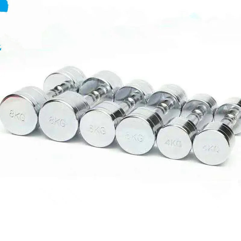 Silver electroplated pure steel dumbbell on a grey background, showing ergonomic handle.