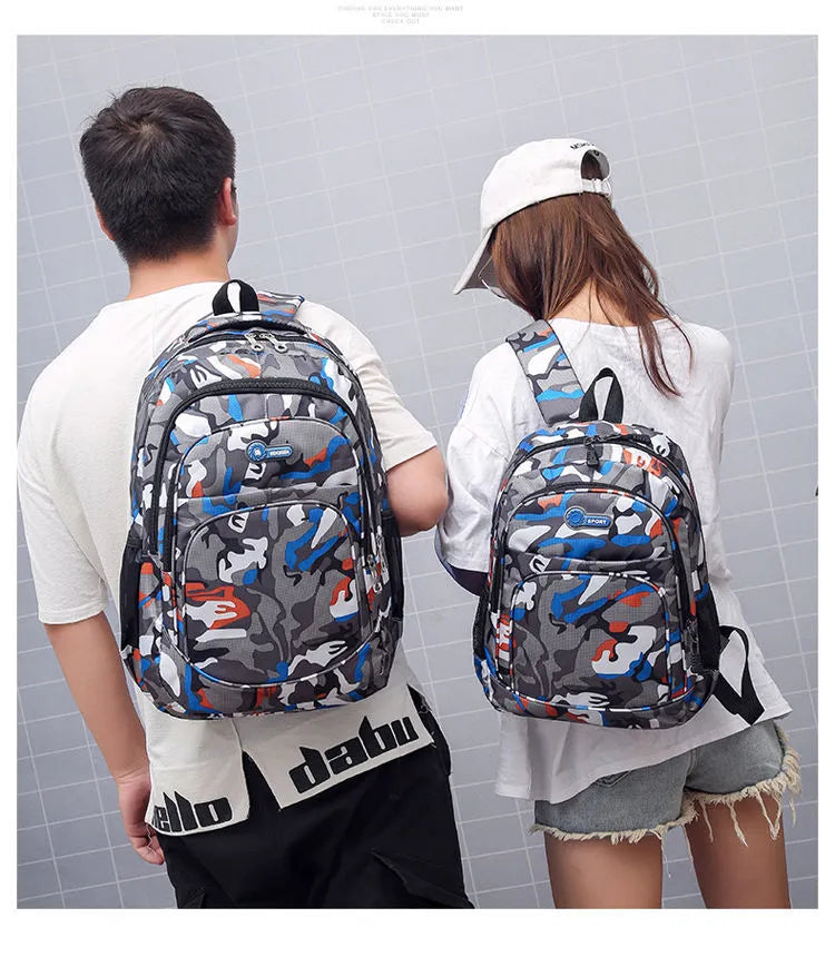 Teenage backpack in Oxford fabric showing side zipper pockets and breathable shoulder straps