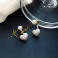 Women's Korean-style heart-shaped pearl stud earrings with electroplated alloy and artificial gemstones
