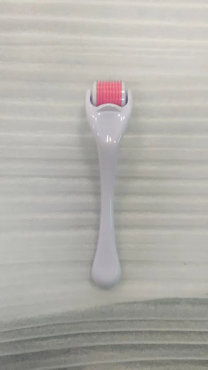 540 micro needle derma roller showing handle and needle wheel in a selected colour