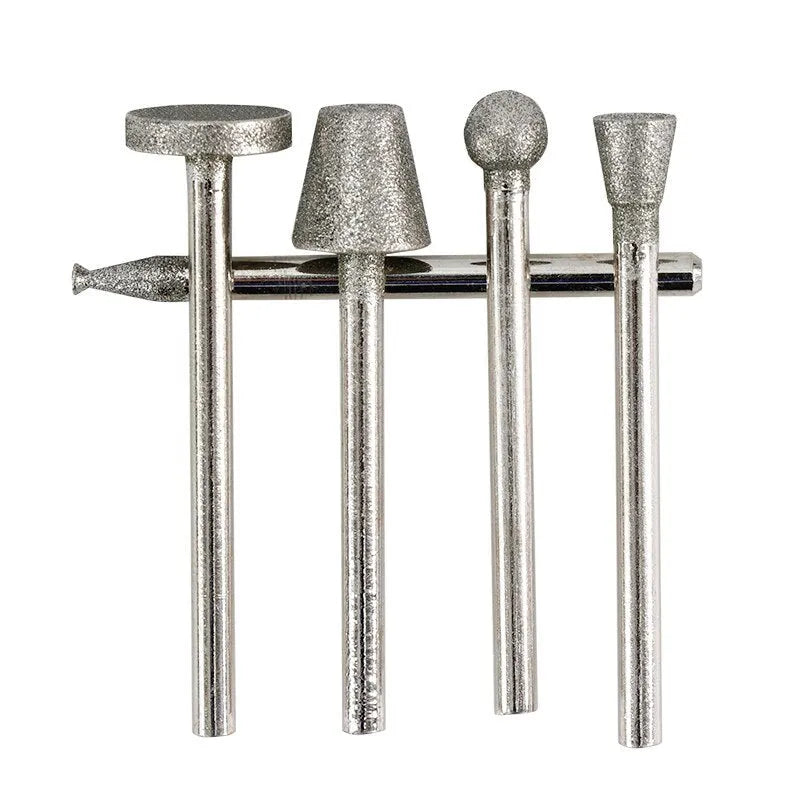 Alloy diamond grinding head set with elliptical cone shape and 3mm shank for glass, jade, and stone work.