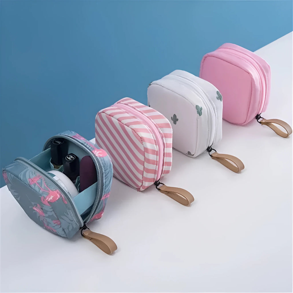 Cloth cube-shaped makeup storage bag shown in blue, pink, white, and white pink colour options.