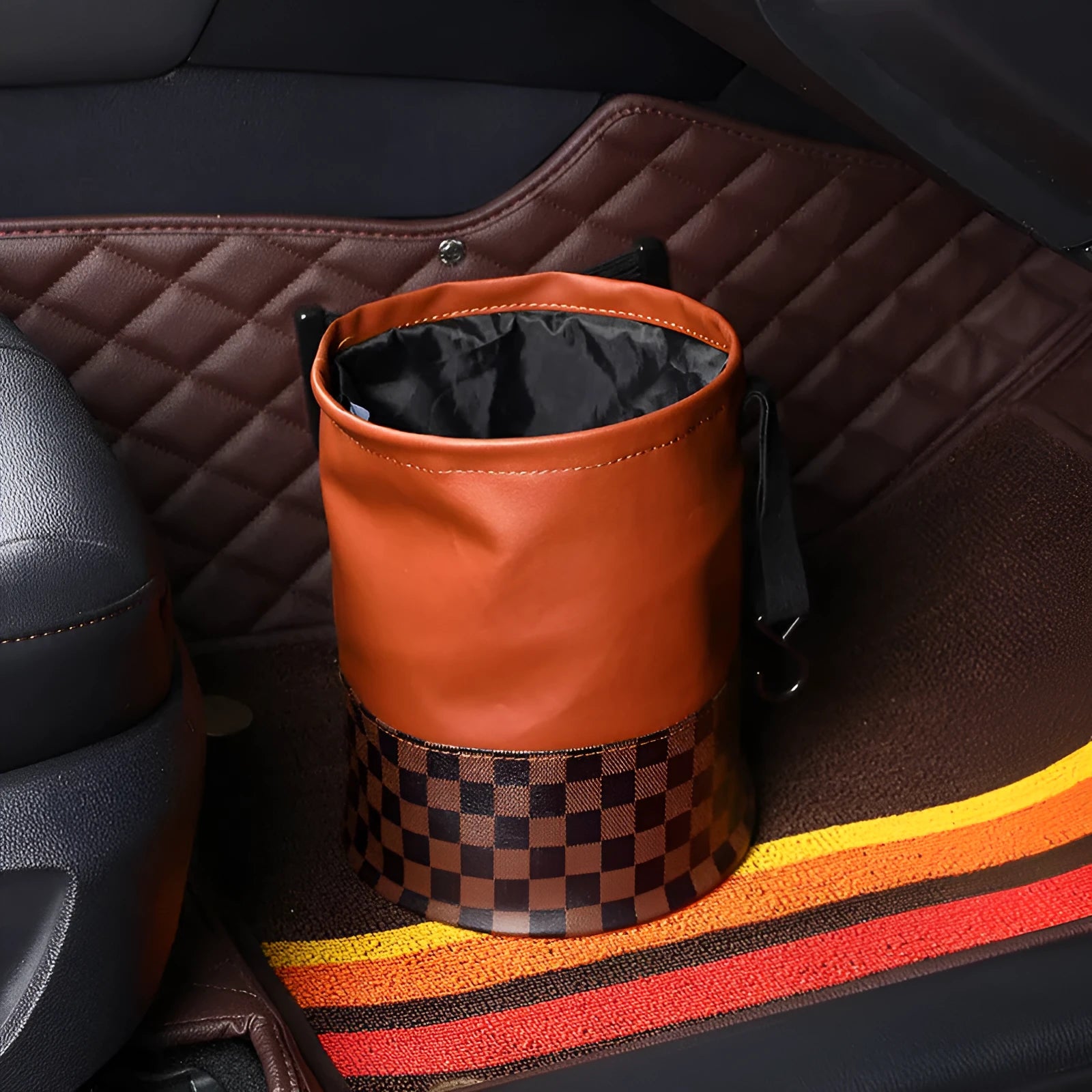 Brown retractable leather car trash can showing expanded and folded positions