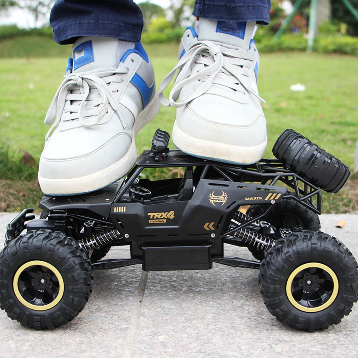Large black 4WD off-road remote control climbing car with 2.4G wireless controller