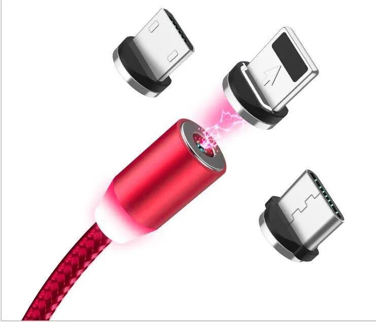 YBD black and red braided magnetic charging cable with Lightning, Micro USB, and Type-C connectors on a table.