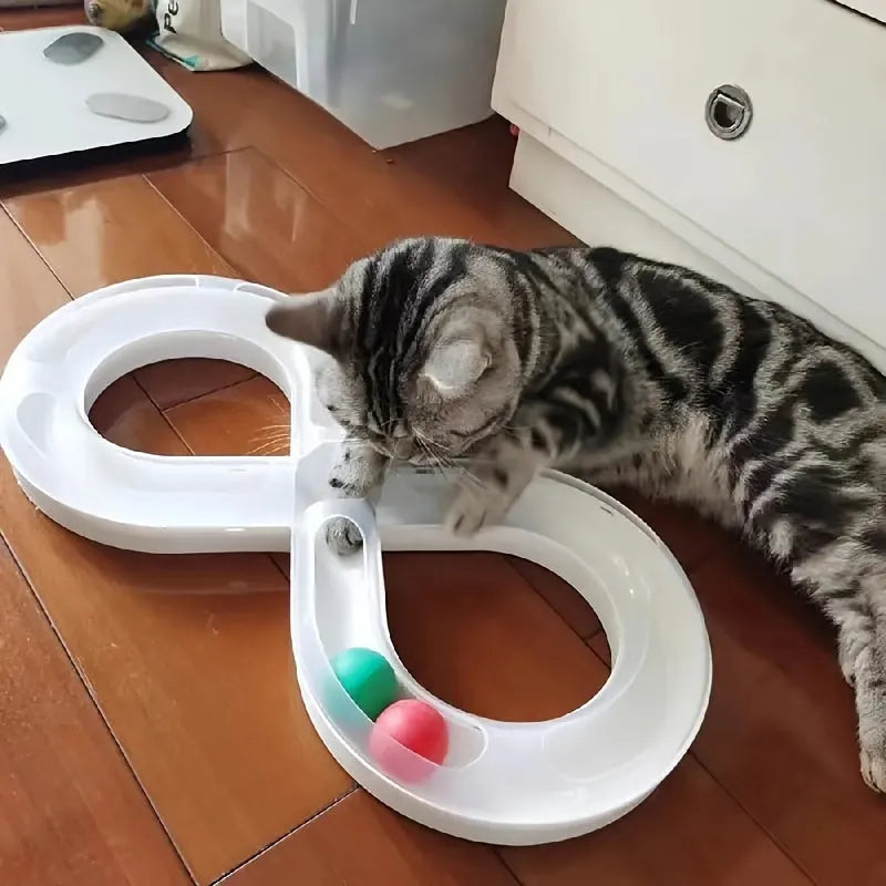 Blue and white cat toy with turntable track ball and teasing stick for interactive feline play