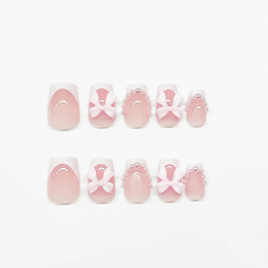 French manicure false nails set with white tips featuring tulip, bow, starry sky and leopard print patterns