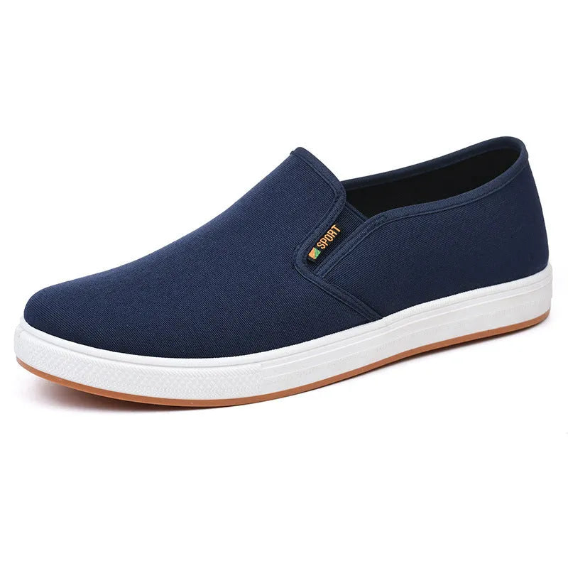 Men's black slip-on canvas shoes with round toe and composite sole