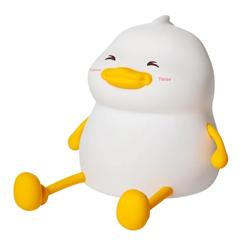 Chubby night light desk lamp with silicone phone holder in soft glow