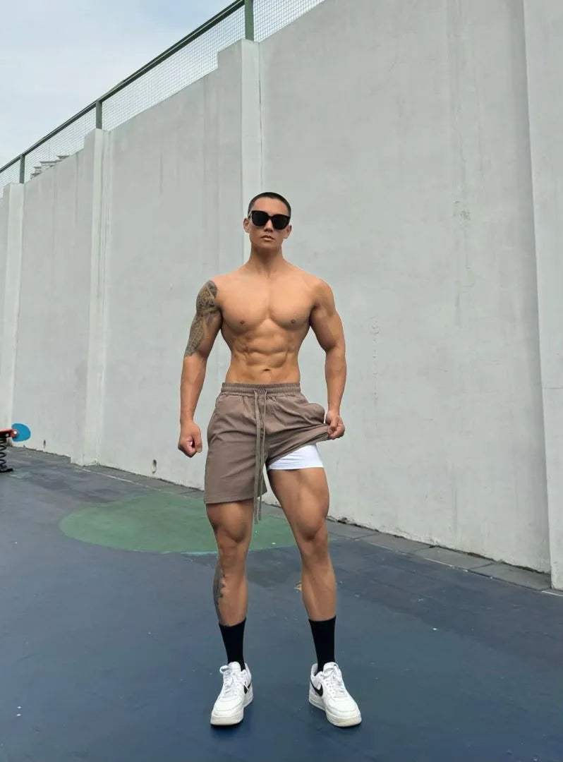 Men's ice silk quick-drying shorts in casual double-layer design