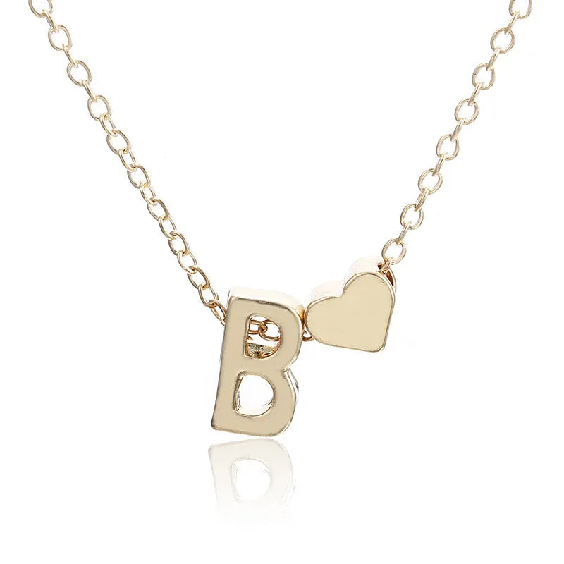 Peach heart shaped alloy letter pendant necklace on chain in gold colour