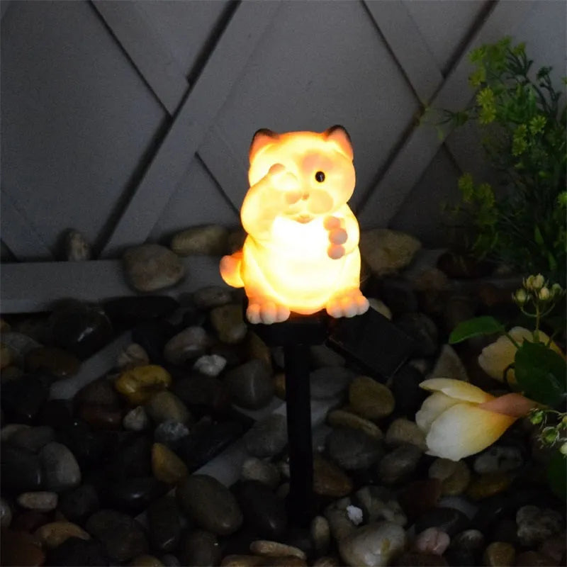 Brown cat-shaped solar lawn light for garden decoration with solar panel and LED illumination