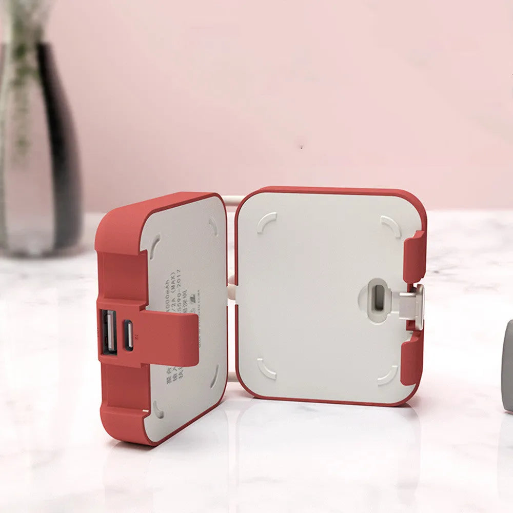 Handbag back clip power bank in blue, showing clip, phone stand function, and Type-C/Lightning ports.